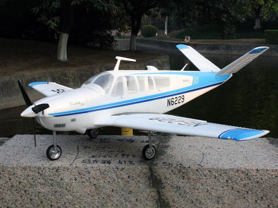 Радиоуправляемый самолет Top RC ST Beechcraft Bonanza V35 голубой 1280мм (шасси) PNP